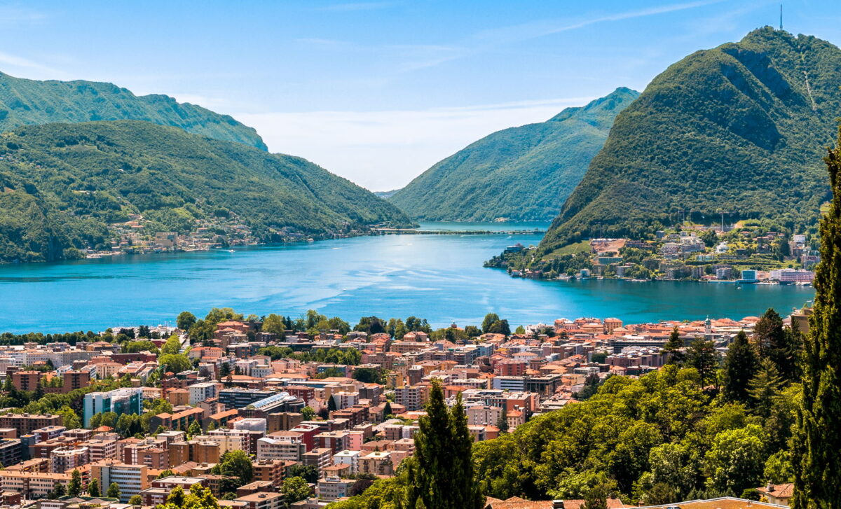Landscape of Lugano lake, mountains and the city